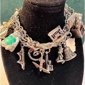 Rhythm vintage sterling charm bracelet, 18 charms